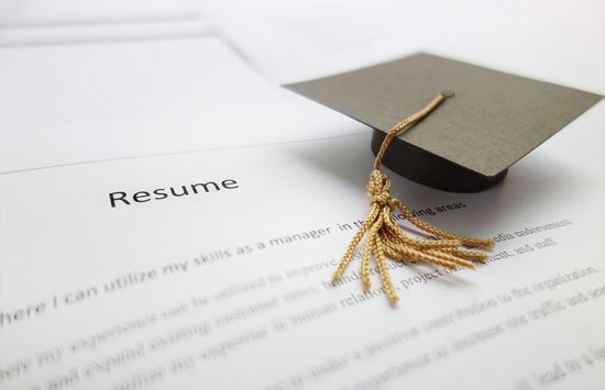 mortar board cap on top of a resume
