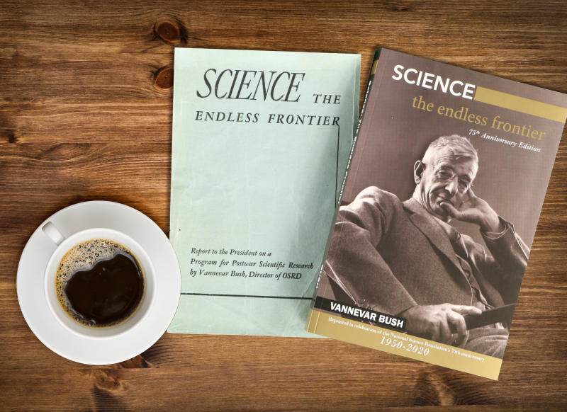 image of two books and a cup of coffee on a wooden table
