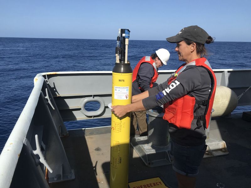 Researchers with deep sea sensing floats