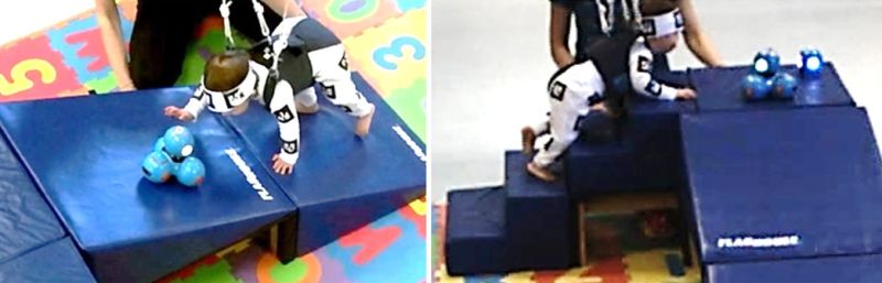 Child playing with robot swarm