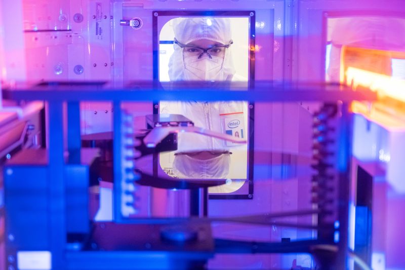 : Intel employee in clean room "bunny suit" works at Intel's D1X factory in Hillsboro, Oregon.