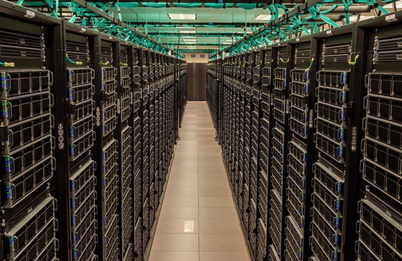 View between rows of supercomputer Frontera's servers