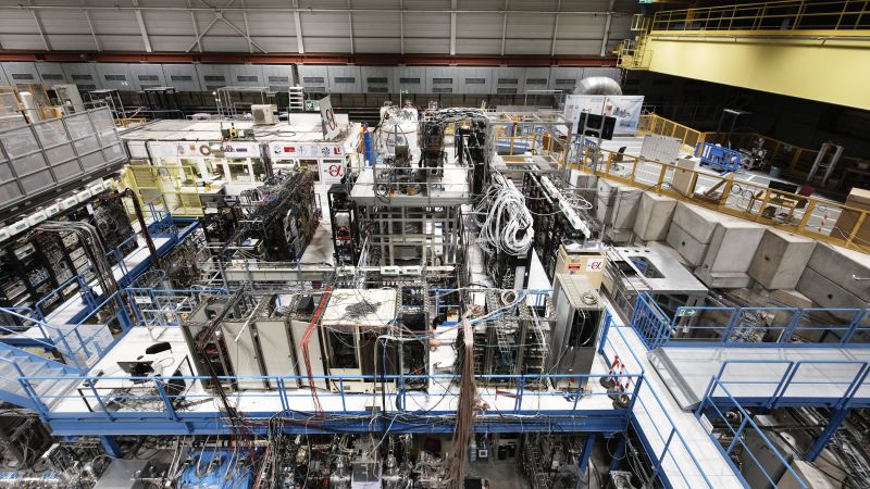 A cavernous laboratory filled with equipment and wires.