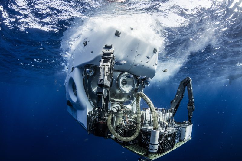 A submersible in the water and breaking the surface.