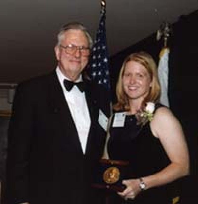 Arden Bement, NSF Acting Director with Kristi Anseth holding an award