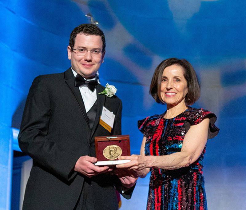 mark receiving award from director Cordova