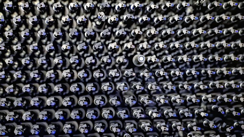 Just some of DESI's 5000 robotic "eyes" which are small lenses on the ends of optic fibers that feed the light from stars and galaxies onto one of ten spectrographs in the basement of the NSF Mayall telescope's dome.