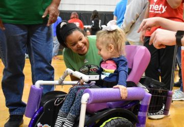 Lexi sits next to Brooklynn in her car