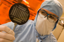 A researcher looks at a semiconductor
