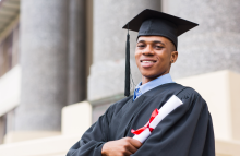 Student in grad outfit