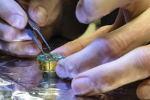 Connecting wires to the interface of the topological insulator and superconductor enables probing of novel electronic properties. Researchers aim for qubits based on theorized Majorana particles.