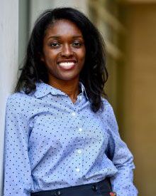 A person smiling at the camera.