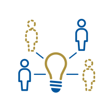 A group of people surrounding a lightbulb.