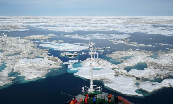 A view of the Chukchi Sea in front of the ship R/V Xue Long, which is moving through an ice patch.