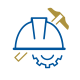 A hard hat in front of a gear and a pickaxe