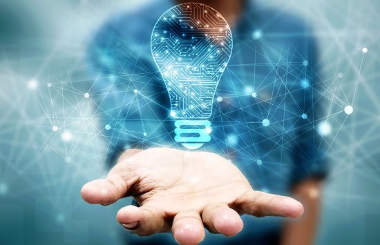 Image of a hand with an illustrated light bulb hovering above