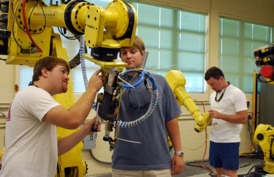 Students working with robots