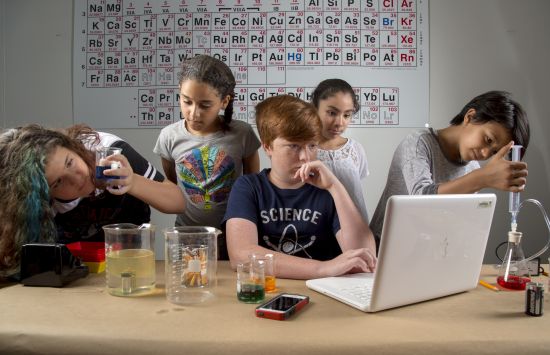 Students performing experiments