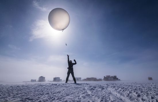 Launching a radiosonde at Summit Station, Greenland