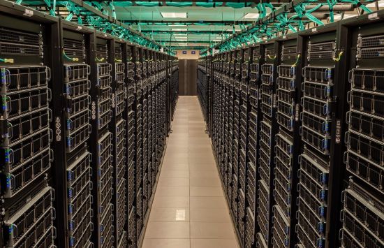 View between rows of supercomputer Frontera's servers