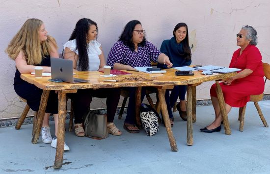 Researchers and collaborators discuss ongoing pilot project