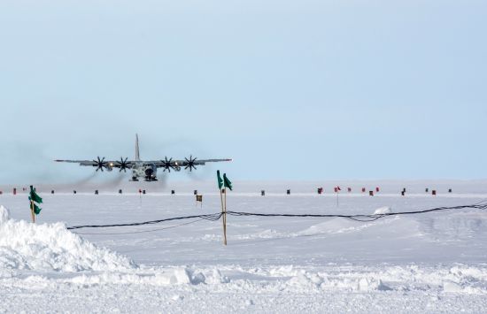 An LC-130 approaches Williams Airfield at NSF McMurdo Station.