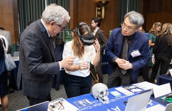 An AI demonstration table at an outreach event