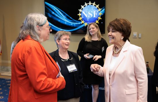 A group of individuals gather at an outreach day.