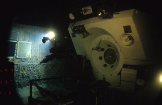 A deep-sea submersible shines a light on the wreckage of the Titanic.