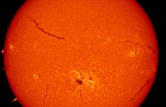 A glowing orange-red sphere.