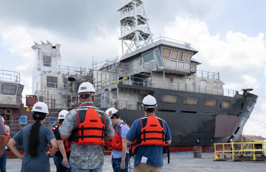 Oregon State University representatives celebrate the launch of R/V Taani in Houma, Louisiana