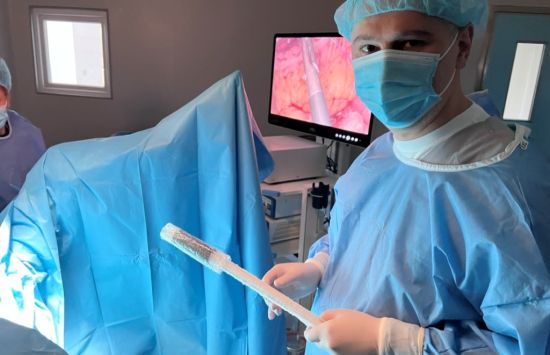 Surgeon preparing medical device for gastrointestinal disease