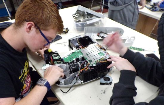 High school students work on reverse engineering