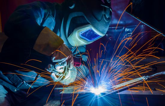 Student welding.