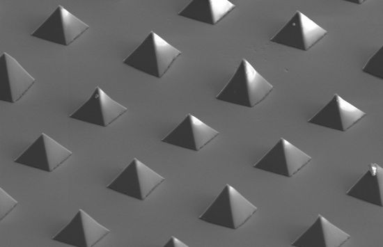Black and white image of microscopic pyramid shape.
