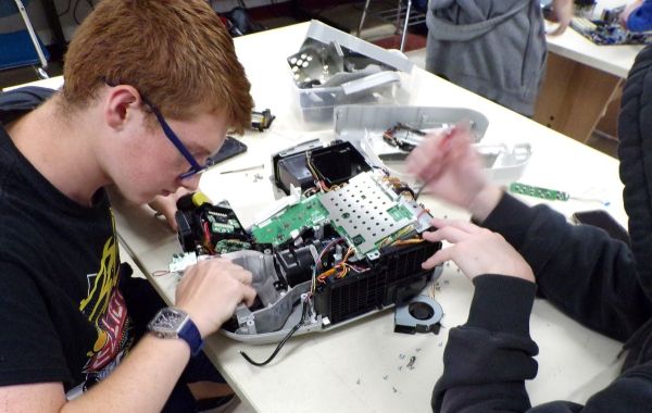 High school students work on reverse engineering