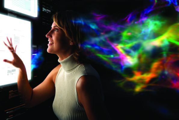 Woman looking at floating computer screen