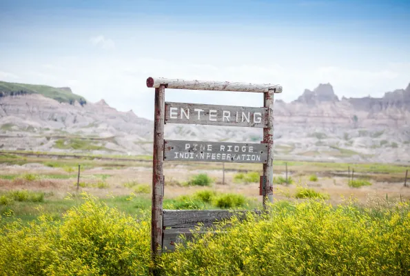 Sign that reads Entering Pine Ridge Indian Reservation