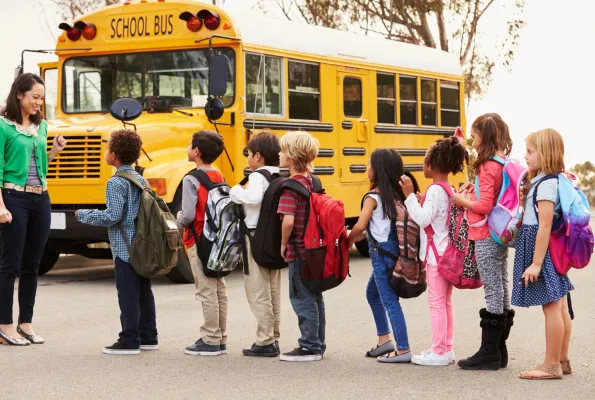 Students and bus from shutterstock