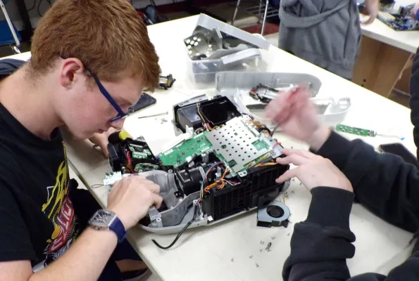 High school students work on reverse engineering