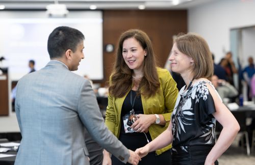 Erwin Gianchandani, Assistant Director of TIP, greets attendees at NSF's 2023 Industry Convening. NSF's Directorate for Technology, Innovation and Partnerships convened industry leaders to explore potential areas of collaboration.