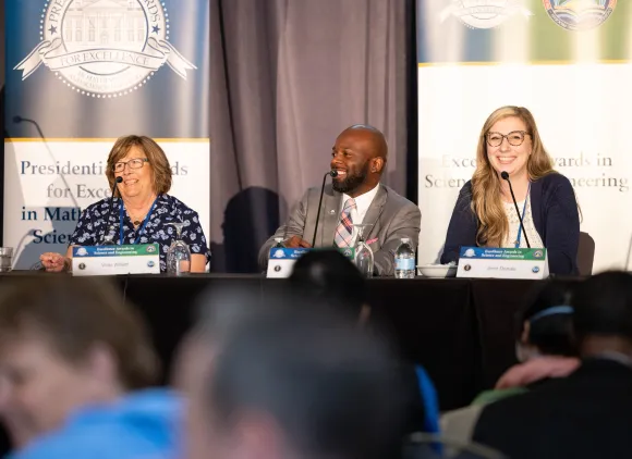 People participating in a panel discussion.