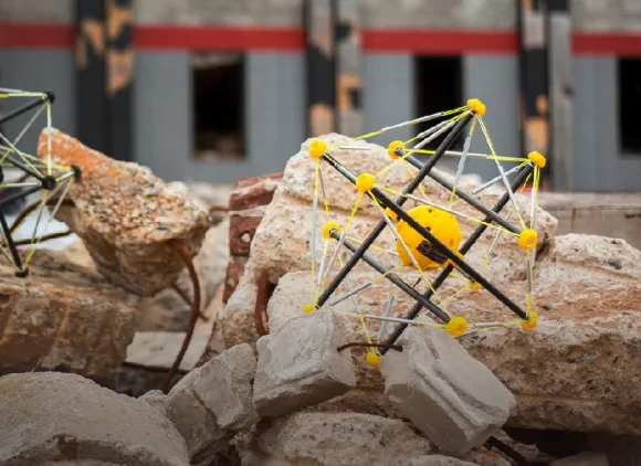 Abstract-looking robots crawling over rubble