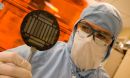 scientist in a lab suit