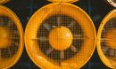 Close-up of a giant, human-sized fan.