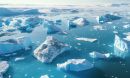 Generative AI Aerial view of Antarctic icebergs in blue water