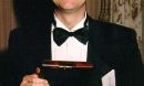 Dr. Eric Cornell holding his medal