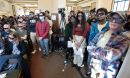 In a live demonstration at the launch of the Public Quantum Network in the Urbana Free Library, members of the public wear polarizing glasses to experience for themselves the measurement of light's polarization.