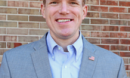 portrait of joe miller in grey suit jacket