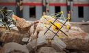 Abstract-looking robots crawling over rubble